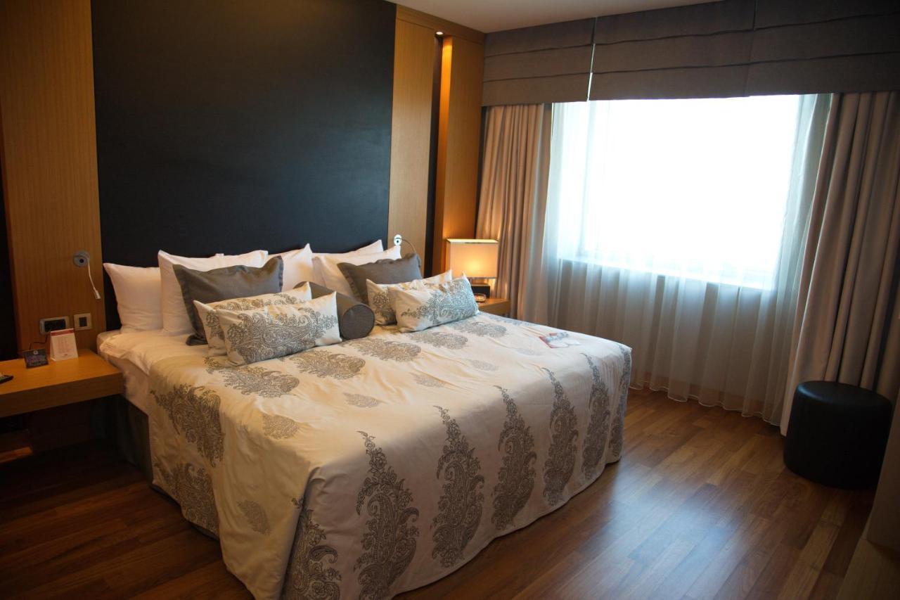 Cpankara Hotel Ancara Exterior foto A bedroom in the hotel